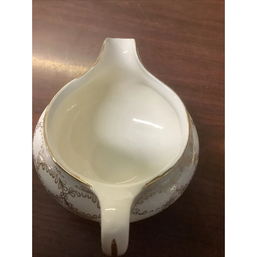 VINTAGE HOMER LAUGHLIN EGGSHELL NAUTILUS C46N5 FLORAL Sugar And Creamer
